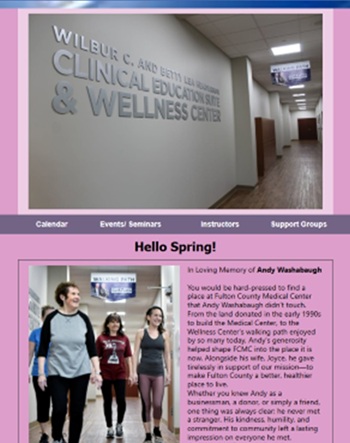 Four people walking around the wellness center